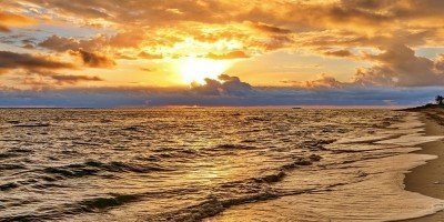 Magisk solnedgång på stranden i Varadero, Kuba